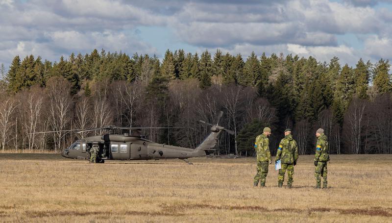 swedish soldiers with a black hawk