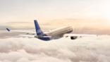 SAS aircraft inflight above the clouds