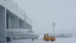 Snowy aircraft hangar