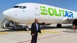 Hamdi Osman, chairman and CEO of Solitaire Group in front of SolitAir aircraft