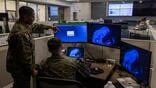 Marines working at operations center.