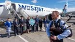 The arrival of WestJet from Toronto.