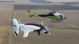 Art credit: Airbus Caption: Acubed's autonomous Vahana (foreground) demonstrated full transition between vertical and wingborne flight in 2019