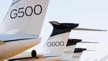 a line up of Gulfstream aircraft