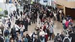People wait in long security lines at LaGuardia Airport on March 25, 2026 credit: getty
