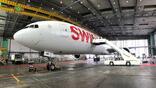 A Swiss 777-300ER in the airline's Zurich hangar.