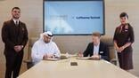 Capt. Majed Al Marzouqi (center left), Etihad’s chief operations and guest officer, and Christian Leifeld (center right), Lufthansa Technik CFO, sign contracts on Nov. 18 at the Dubai Airshow.