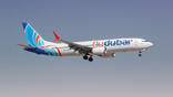 FlyDubai Boeing 737 MAX 8 flying in sky