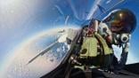 Cockpit view of pilot in Saab F-39E Gripen firing missile