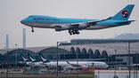 Korean Air Cargo aircraft descending for landing at Hong Kong International Airport